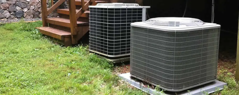 Heat pump installation and service units outside a home in Warwick, RI